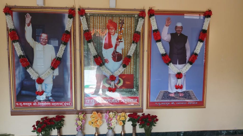 Pictures of Sadguru Shri Nisargadatta Maharaj, Sadguru Shri Ranjit Maharaj and Sadguru Shri Ramakant Maharaj hanging in the Ashram in Nashik.